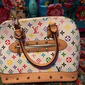 Louis Vuitton Alma bag I inherited. But I’d rather have a plane ticket!